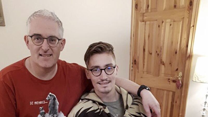 Ross Davidson pictured at his family home in Carrickfergus with his father Andrew 