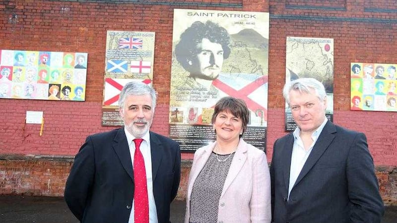 The Housing Executive&#39;s Clark Bailie, First Minister Arlene Foster and artist Ross Wilson launching the artwork 