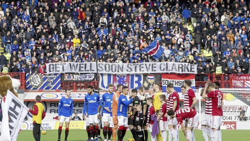 Fans hold up a banner directed at Steve Clarke during the Scottish Premiership match in Hamilton 