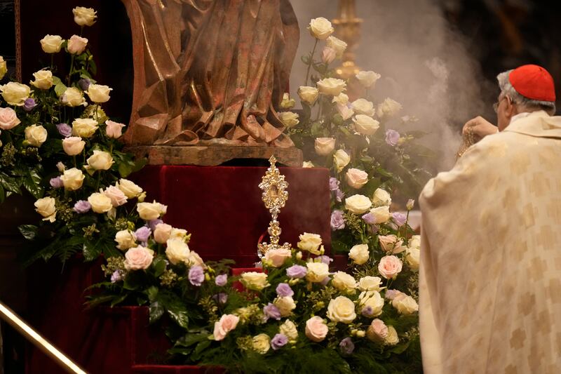 Prefect of the Dicastery for the Causes of Saints, Cardinal Marcello Semeraro, incenses a vessel containing the relics of new saint Mama Antula (Alessandra Tarantino/AP)
