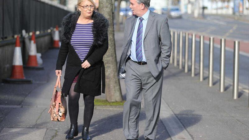Retired Detective Superintendent Colin Murray, who led the Hannah Williams murder investigation that led to Robert Howard's conviction, outside Belfast court with Arlene Arkinson's sister Kathleen. Picture by Hugh Russell