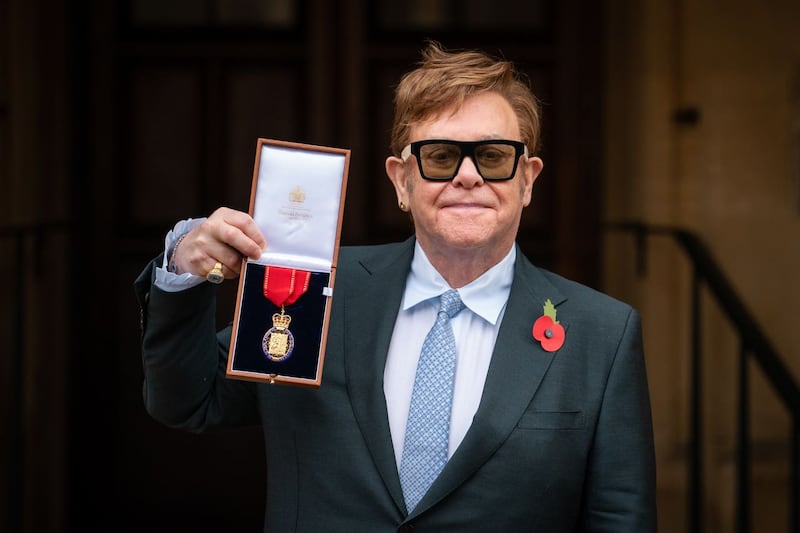 Sir Elton John in 2021 after being invested as a member of the Order of the Companions of Honour for services to music and to charity