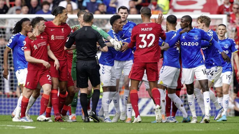 Tempers flare between players during the Premier League match at Anfield between Liverpool and Everton Picture: Peter Byrne/PA  
