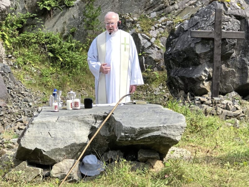 Fr La Flynn, Lough Derg Prior, celebrates Mass at the Mass Rock on the pilgrim path 