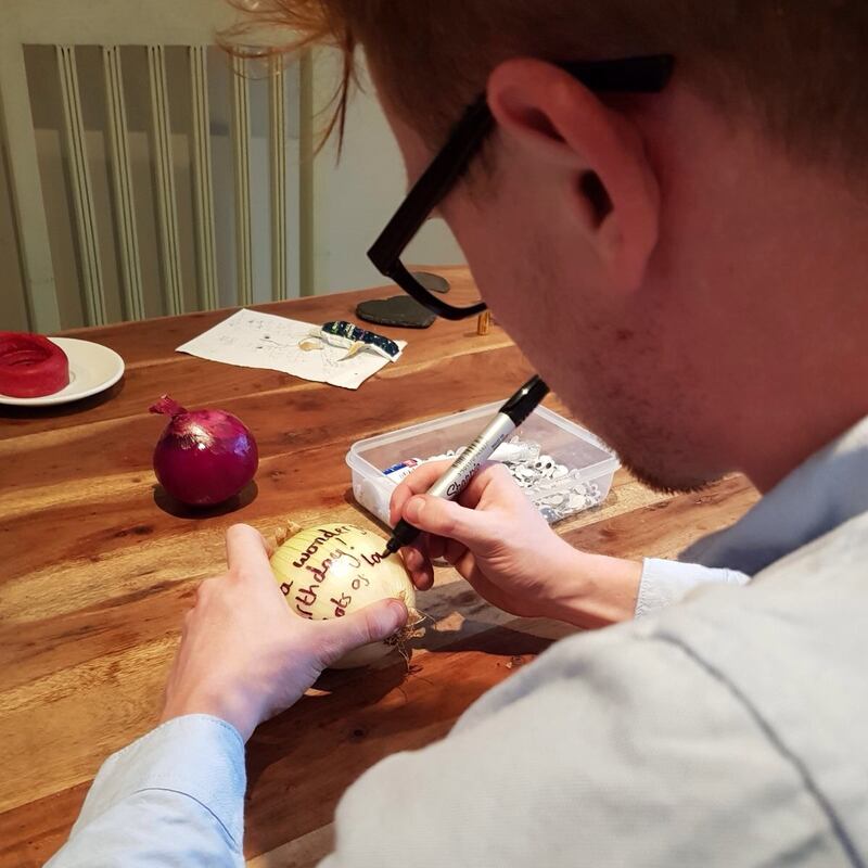 James working on one of the onions