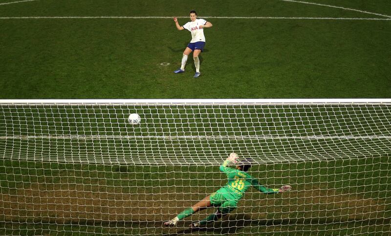 Amy James-Turner scores the winning spot-kick for Tottenham against Manchester City