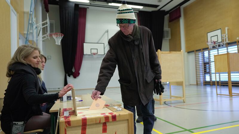 Voters in Finland are choosing between two experienced politicians to be their next president (Sergei Grits/AP)