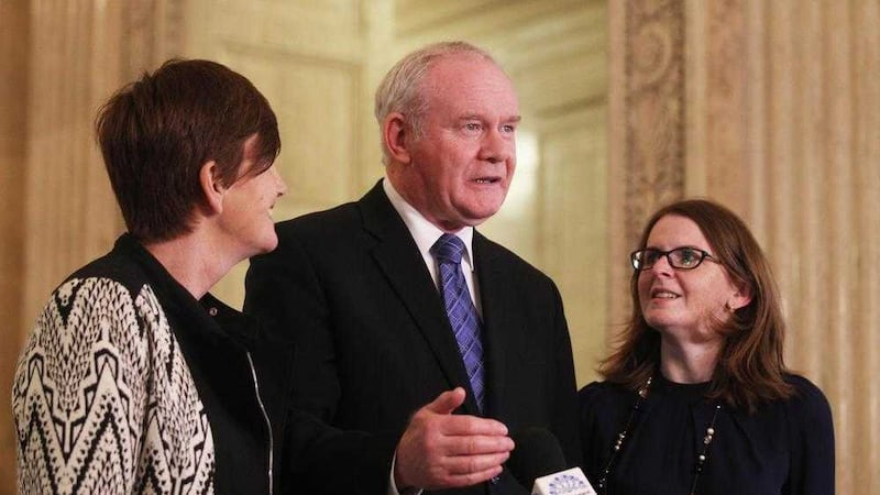 Deputy First Minister Martin McGuiness talks to the media in Stormont, along with Sinn F&eacute;in&#39;s Caitriona Ruane and Caoimhe Archibald. Picture by Matt Bohill 