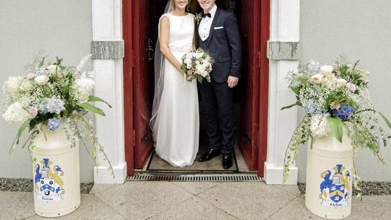 Armagh footballer Patrick Burns and fianc&eacute;e Orla McKay of Burren on their wedding day at St Mary&#39;s Church, Burren 
