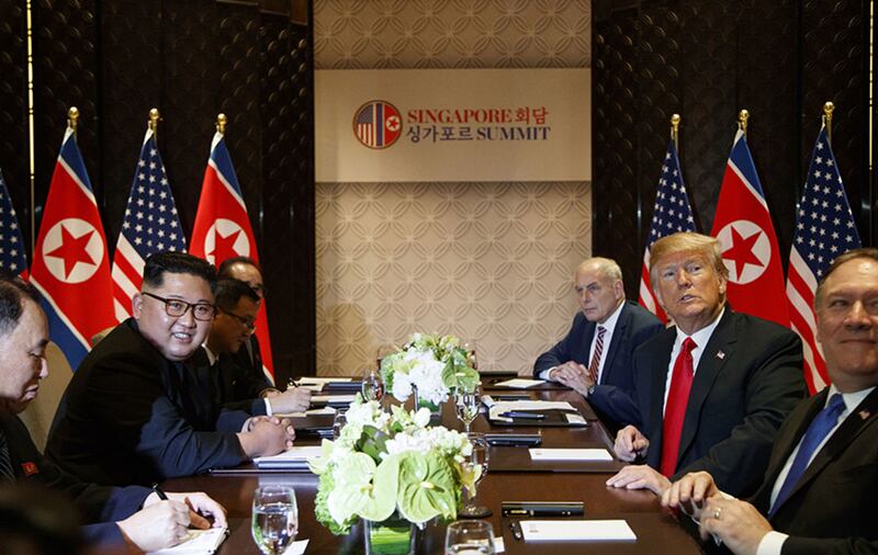 President Donald Trump meets with North Korean leader Kim Jong Un on Sentosa Island, Tuesday, June 12, 2018, in Singapore&nbsp;
