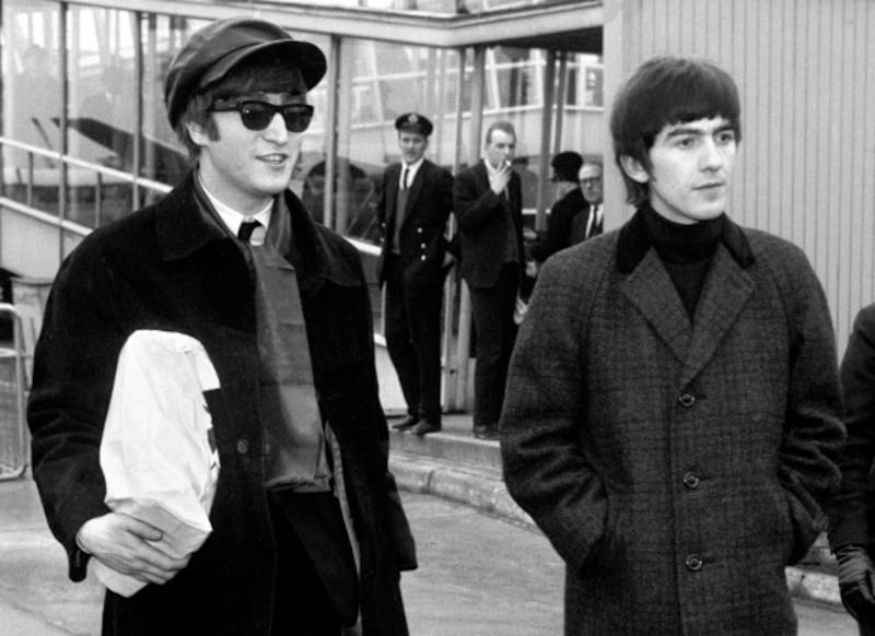 John Lennon (l) and George Harrison (PA)