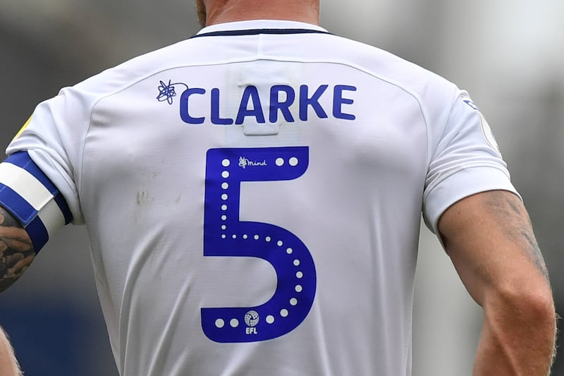 The Mindfulness symbol on the shirt of Preston North End's Tom Clarke during a Championship match