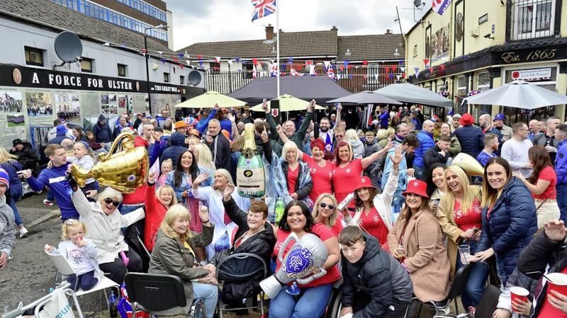 Rangers fans who gathered in west Belfast at the weekend to celebrate their team lifting the Scottish Premiership trophy were warned the PSNI were also in the area to &quot;gather evidence&quot; of any potential Covid-19 breaches. Picture by Pacemaker 