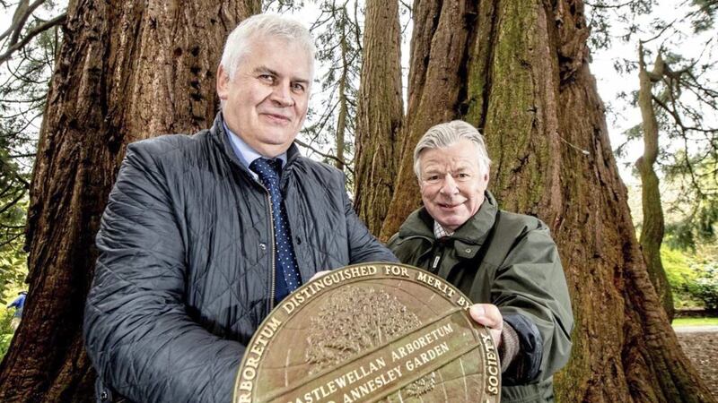 Forest Service Chief Executive John Joe O&#39;Boyle is presented with a plaque by IDS chairman Giles Crisp 
