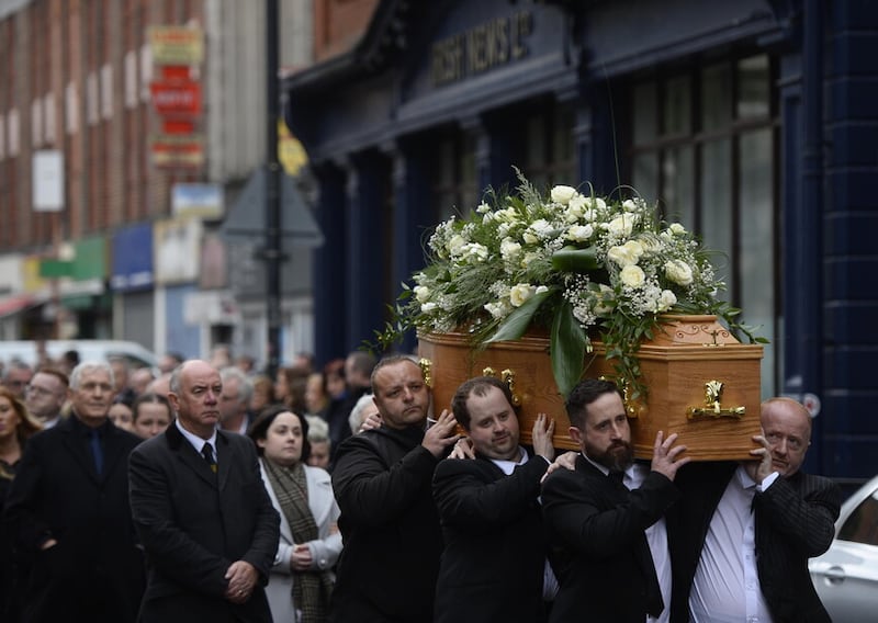Hugh Russell's funeral cortege passes The Irish News offices in Donegall Street