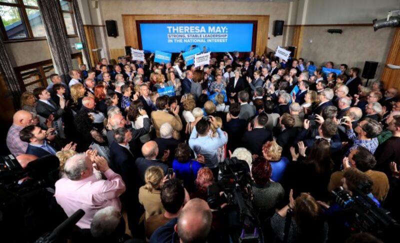 Prime Minister Theresa May (centre right) speaking at Mawdesley Hall in Ormskirk, Lancashire.