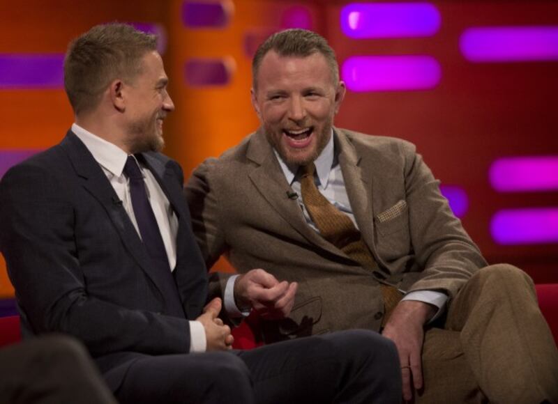 Charlie Hunnam and Guy Ritchie (Isabel Infantes/PA)