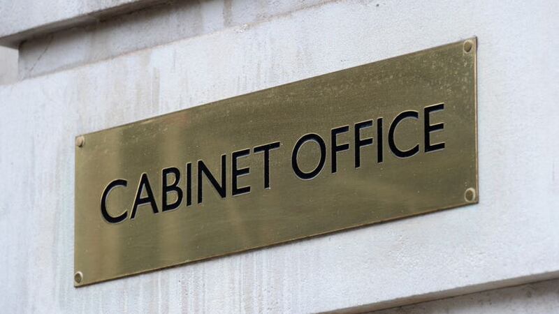 A view of signage for the Cabinet Office in Westminster, London.