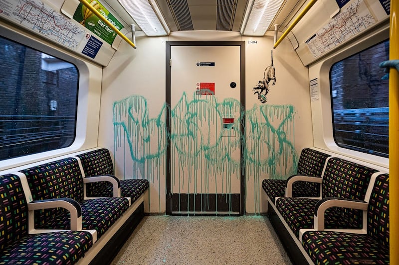 Banksy on London Underground tube