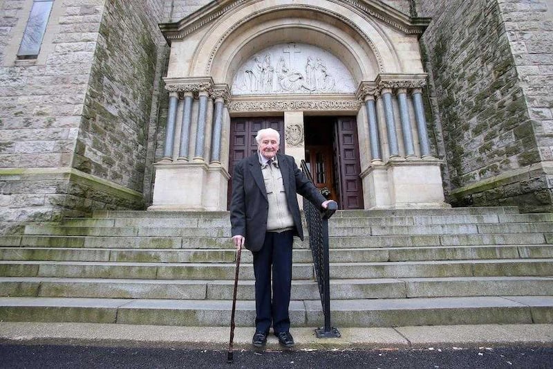 Billy McKee pictured outside Holy Cross Church in Ardoyne where he regularly attends Mass. Picture by by Mal McCann&nbsp;