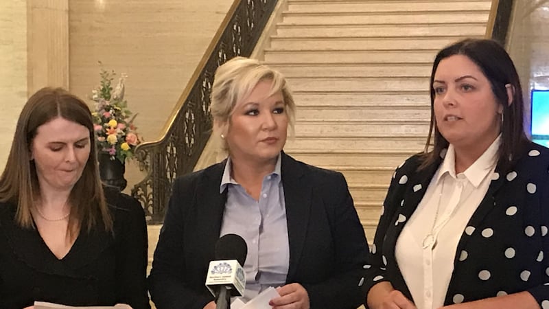 Communities minister Deirdre Hargey (right), alongside Deputy First Minister Michelle O'Neill (centre) and Sinn Fein MLA Caoimhe Archibald (left) in Stormont Buildings, Belfast. Photo by Rebecca Black/PA Wire&nbsp;