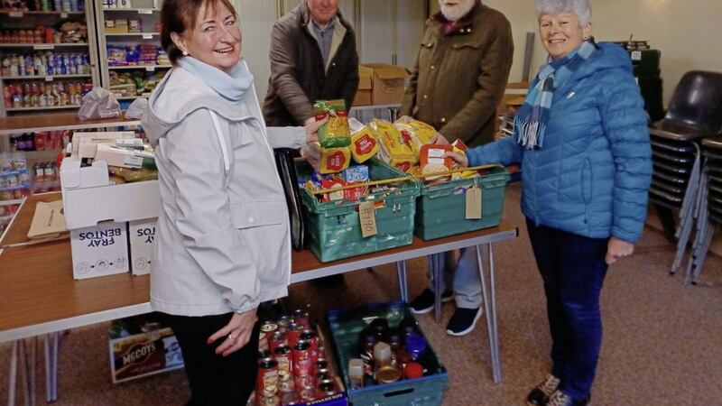 Newcastle Lions president Liz Murphy and Lion Dan O&#39;Reilly with volunteers Manus O&#39;Boyle and Patricia Harvey in the Lions&#39; Six Towns Christmas Food Bank Appeal 