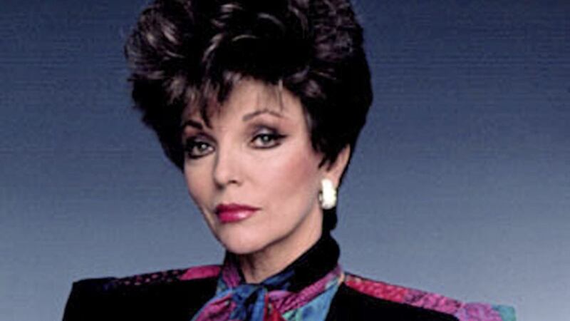 The Dynasty shoulder is back, as seen on Alexis Carrington, played by Joan Collins in the TV series. 