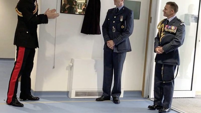 Prince Harry unveils a plaque in honour of Dr Aidan MacCarthy at RAF Honington. Picture from A Doctor&#39;s Sword/Facebook 