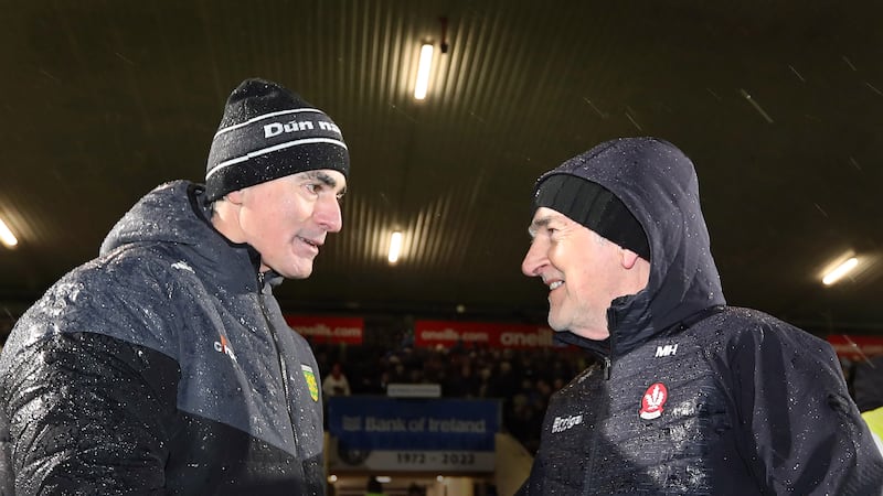 Derry manager Mickey Harte and Donegal manager Jim McGuinness shake hands on the final whistle following the Dr McKenna Cup Final earlier this year. Picture: Margaret McLaughlin