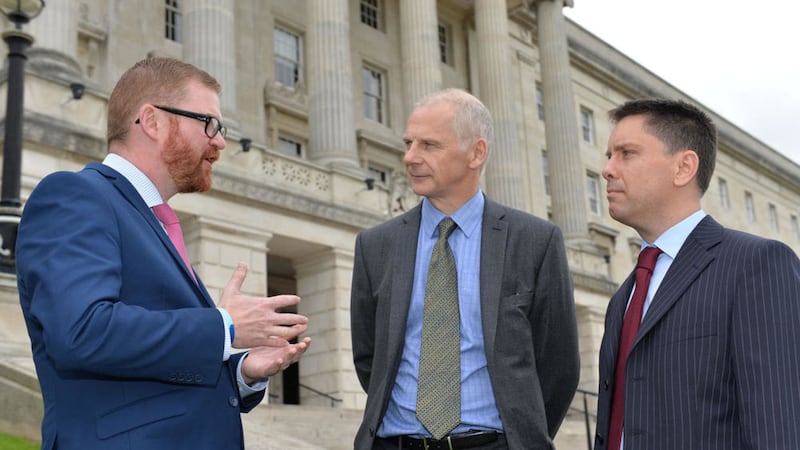 Economy Minister Simon Hamilton with Metaswitch Networks directors Graeme MacArthur and Stuart Warwick. Photo: Aaron McCracken/Harrisons 