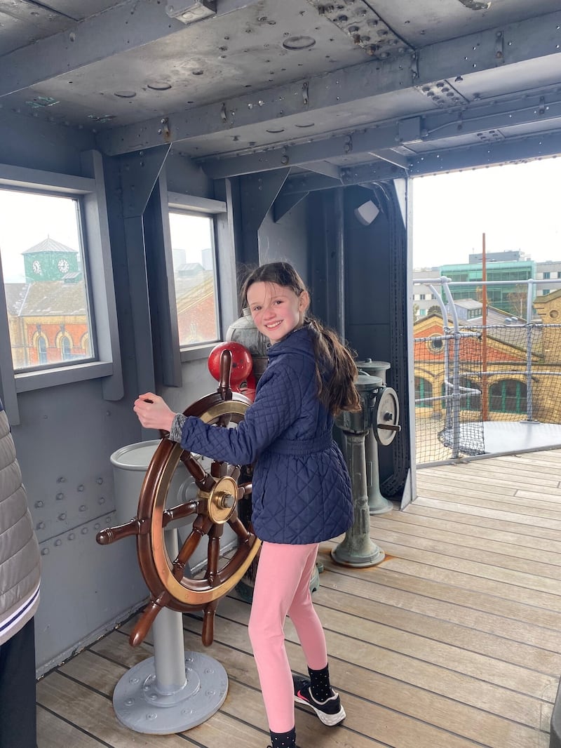 Jenny Lee's daughter Abigail takes the wheel on board HMS Caroline