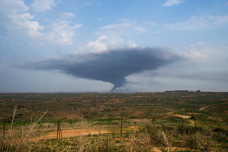 Smoke rises following an Israeli bombardment in the Gaza Strip, as seen from southern Israel (Ohad Zwigenberg/AP)