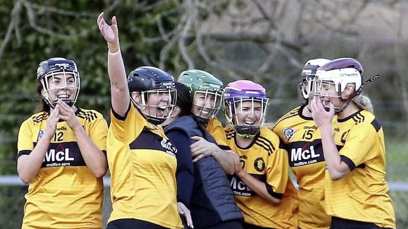 The camogs of East Belfast celebrate their Down junior championship final win over Ballela, but the club is struggling to find a pitch to host its first-ever foray into Ulster this weekend against Killeavy 