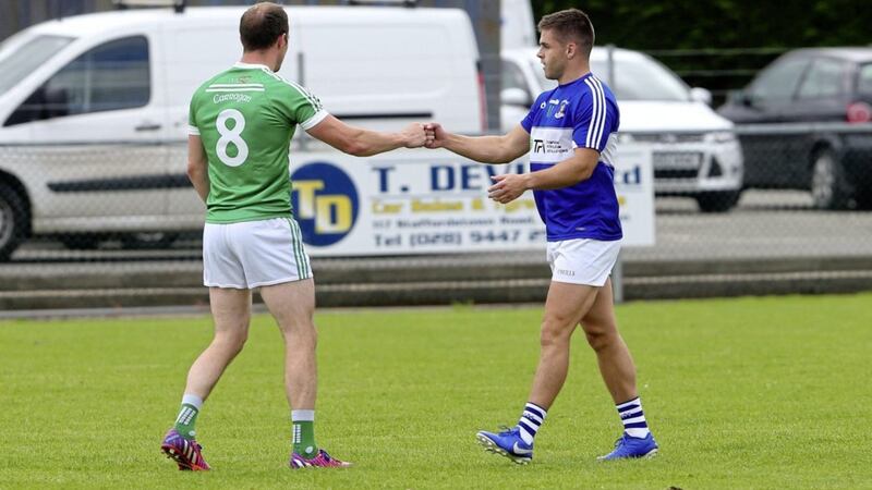 County team-mates Mick McCann and Patrick McBride during yesterday&#39;s ACFL game in Cargin Picture: Mal McCann. 
