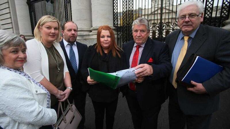 From left Gerty McGlinn, Amanda McCallion, Frank Devlin, Cat Wilkinson, Stanley McCombe and Michael Gallagher representatives of Families of the Omagh bomb victims arrive at Government Buildings to meet the Taoiseach in Dublin for the first time . Picture by Niall Carson/PA Wire 