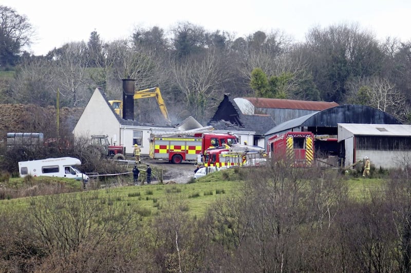 The scene of a fire near Derrylin where three people are dead and one man was arrested. Picture by Mal McCann