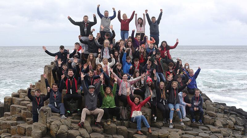Young people from North Coast Integrated College in Coleraine and Gairmscoil Ch&uacute; Uladh in Donegal at the Giants&rsquo; Causeway after their 'Sleep for Peace'