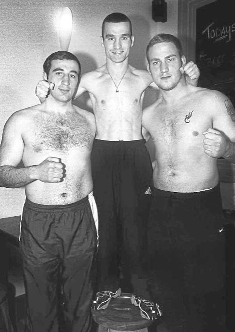 TRIPLE TREAT...Damaen Kelly (centre) is flanked by heavyweight Georgi Kandelaki (left) from Georgia and Danny Watts from Peckham 