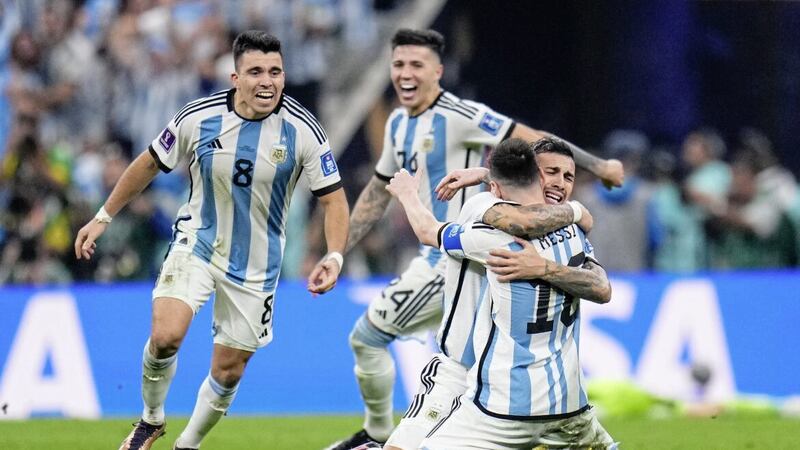 Argentina&#39;s players celebrate winning the World Cup final soccer match between Argentina and France at the Lusail Stadium in Lusail, Qatar, Sunday, Dec.18, 2022. (AP Photo/Manu Fernandez). 