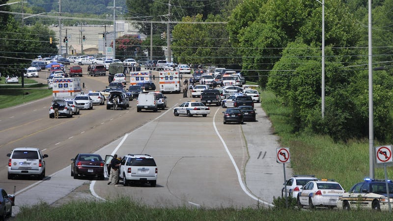 Police block a highway after a shooting in Tennessee yesterday. Picture by Tim Barber, Chattanooga Times Free Press 