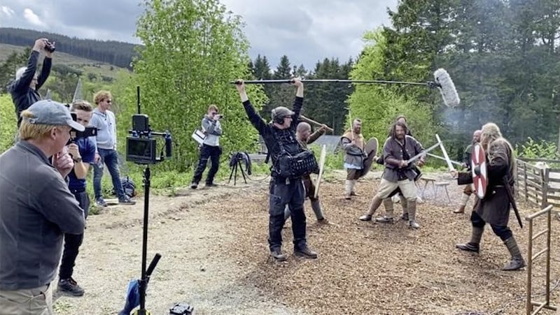 Donaghmore actor Brian McMahon, pictured centre during a sword fight scene, says filming in Gortin Glens has been a &quot;home from home&quot; 