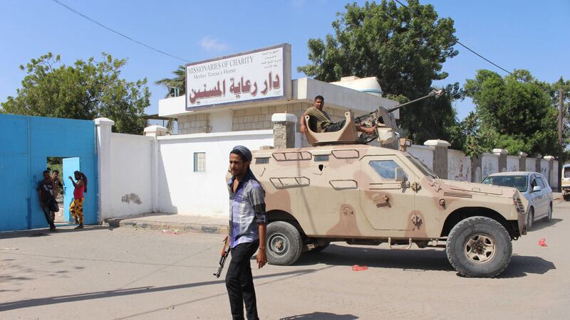 Yemeni security forces outside the Missionaries of Charity retirement home in Aden, Yemen after gunmen stormed the building, killing 16 people. Picture by Associated Press