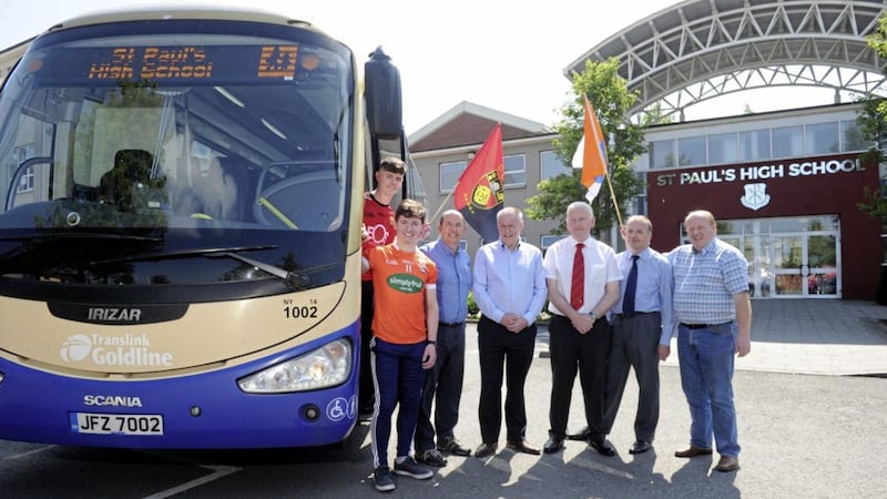 Ulster GAA are teaming up with Translink to provide a free shuttle bus service for supporters to enjoy convenient access to and from the Down v Armagh Ulster Football Championship games at P&aacute;irc Esler, Newry on Sunday. Double-decker buses will operate from Burren GAA club, via Warrenpoint, St Paul&#39;s School, Bessbrook and Newry train station. The buses will also operate after the match to return patrons to their pick-up points. Pictured are Down and Armagh minor players with Jarlath Tinnelly of the Down county committee, Ulster secretary Brian McAvoy, Ulster PRO Michael Geoghegan, Translink&#39;s Greg McLaughlin and Mickey Savage of Armagh&#39;s county committee 