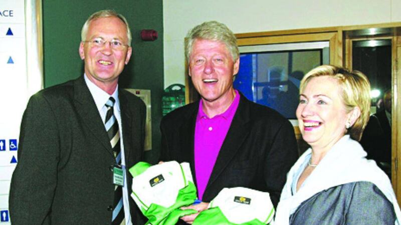 Peter McGinnity presenting Fermanagh shirts to Bill and Hilary Clinton. 