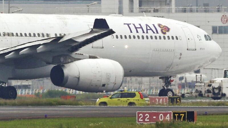 One of the planes involved was with the Thai Airways International airline (Kyodo News via AP)