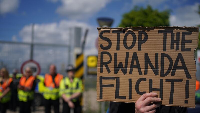 Demonstrators at a removal centre at Gatwick protest against plans to send migrants to Rwanda