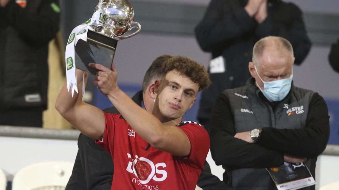 Down captain Shealan Johnston lifts the Danny Murphy Cup after his county's win over Monaghan in the Eirgrid Ulster U20 Football Championship final the Athletic Grounds on Friday night<br/>Picture: Hugh Russell