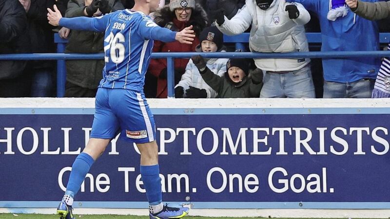 Matthew Shevlin celebrates with the Coleraine fans after scoring the second in Saturday&#39;s win over Linfield at Ballycastle Road Picture by Desmond Loughery/Pacemaker 