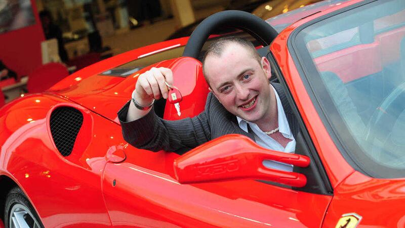 Ryan Magee pictured with his &pound;157,000 Ferrari F430 Spider his dream car 
