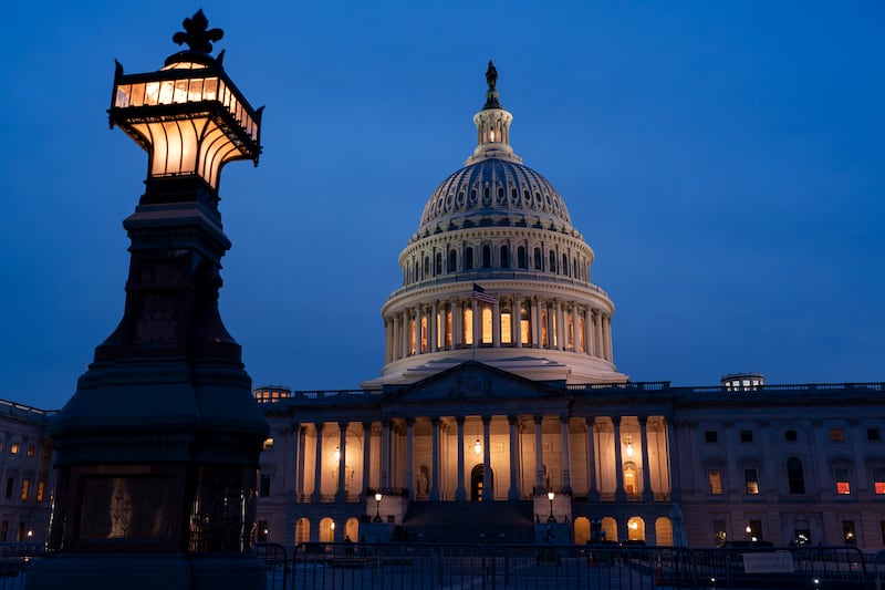 The US Capitol in Washington is illuminated as the Senate settled in for a rare weekend session to work on a package of wartime funding for Ukraine, Israel and other US allies (J. Scott Applewhite/AP)